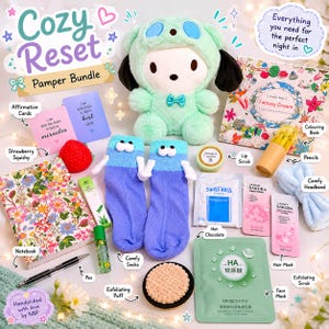 May include: A 'Cozy Reset' pamper bundle with a green dog plush, affirmation cards, a strawberry squishy, socks, a notebook, and beauty products. Includes a coloring book, pencils, a headband, and a face mask. Handpicked with love.