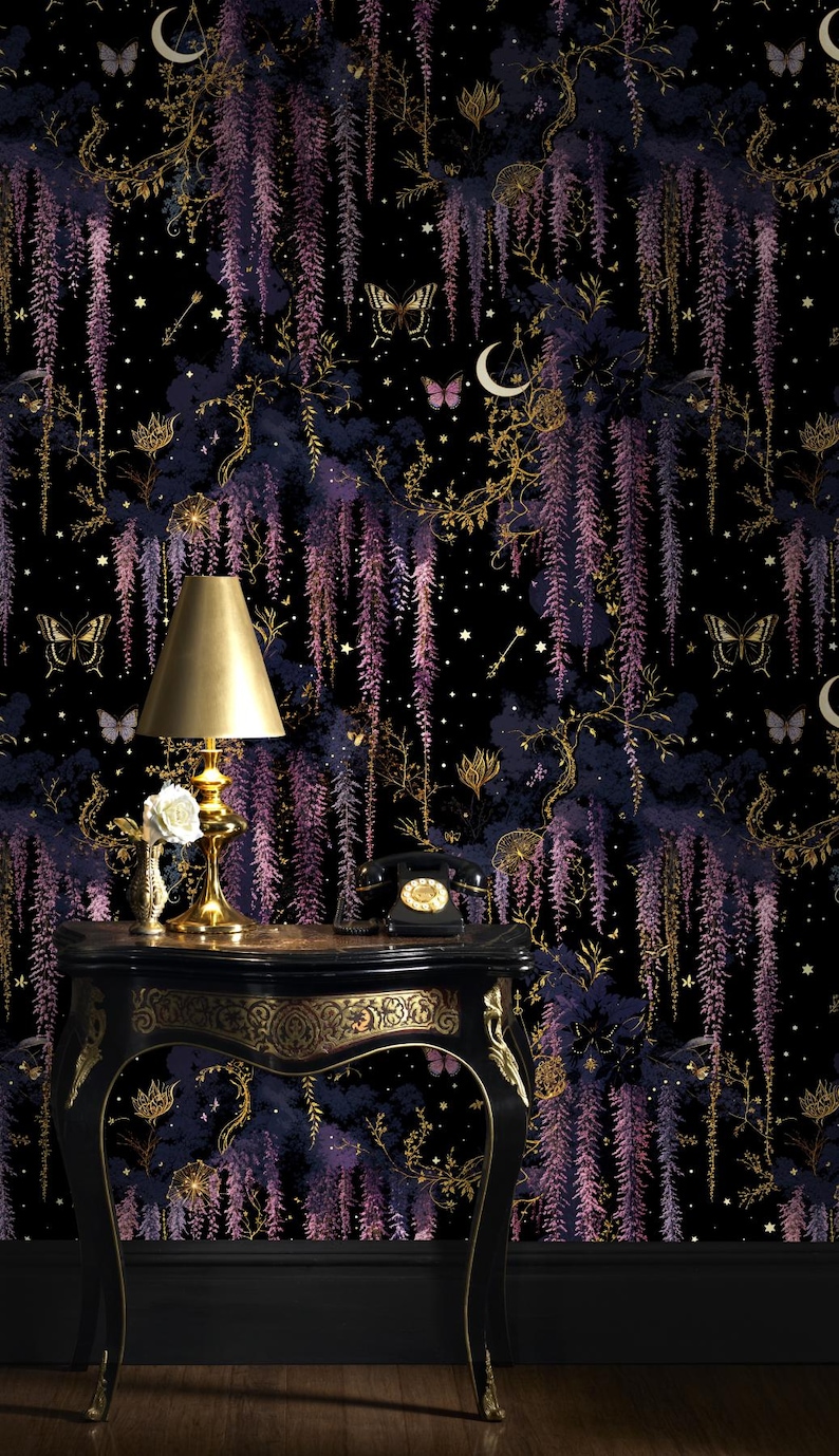 May include: Black wallpaper with a repeating pattern of purple wisteria, butterflies, and stars. A gold-toned lamp and a black table with gold accents are in the foreground. A vintage black telephone sits on the table.