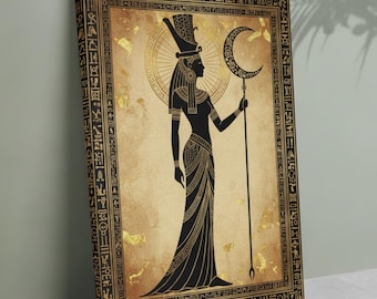 May include: A framed canvas print depicting a black silhouette of an Egyptian figure holding a crescent moon staff. The figure is set against a tan background with gold accents and hieroglyphic borders. The artwork evokes ancient Egyptian art and mythology.