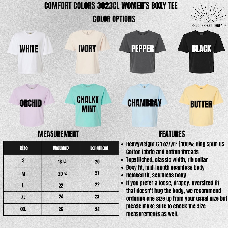 May include: A display of Comfort Colors 3023CL boxy tees in various colors: white, ivory, pepper, black, orchid, chalky mint, chambray, and butter. A size chart shows measurements in inches. Features include heavyweight cotton fabric, a boxy fit, and a relaxed style.