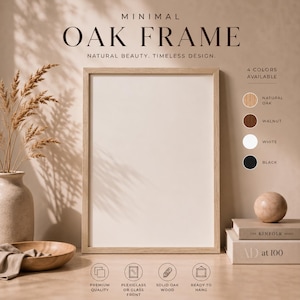 May include: A rectangular light wood frame with a blank white center. Text reads: MINIMAL OAK FRAME, NATURAL BEAUTY. TIMELESS DESIGN. 4 COLORS AVAILABLE: NATURAL OAK, WALNUT, WHITE, BLACK. Icons indicate premium quality, plexiglass or glass front, solid oak wood, and ready to hang.