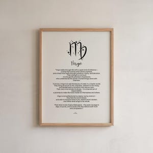 May include: A framed print with a light wood frame. The print features the Virgo astrological symbol and the word "Virgo" in a decorative font. The text describes Virgo's characteristics and traits.