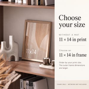 May include: A light wood picture frame containing an abstract print with beige and tan shapes. Text on the right reads: Choose your size, WITHOUT A MAT 11 x 14 in print, Choose an 11 x 14 in frame, Order by your print size. FRAME ONLY - ARTWORK NOT INCLUDED.