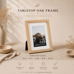 May include: A light-colored oak tabletop frame with a white mat, displaying a landscape photo. The frame text reads: TABLETOP OAK FRAME, PLEXIGLASS OR REAL GLASS, 6x8 matted to 4x6, TABLETOP SIZES 4x6, 5x7, 6x8, 8x8, 8x10, and ANARTPRINTSTUDIO.