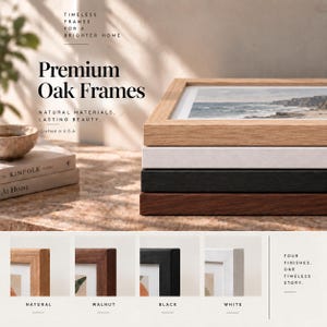 May include: A stack of four rectangular oak frames in natural, white, black, and walnut finishes. Text on the image reads: Timeless frames for a brighter home, Premium Oak Frames, Natural materials. Lasting beauty. Crafted in U.S.A, Four finishes. One timeless story.