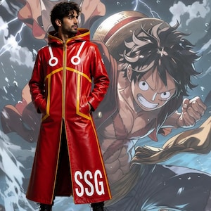 May include: A long red hooded coat made of a smooth material, featuring a front zipper, yellow trim, and white circular accents on the chest. The lower left side of the coat displays the white text SSG in a bold, sans-serif font.