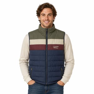 May include: A color-blocked puffer vest featuring horizontal stripes in olive green, beige, and maroon, with a navy blue lower section. The chest displays the text Academy 1948 in white script. It includes a full-length front zipper and two side pockets.