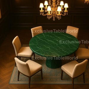 May include: A circular, green marble dining table with a pedestal base, encircled by four beige upholstered chairs. The table rests on a patterned rug, and the room is lit by a chandelier. Text on the table reads "ExclusiveTableWorld".