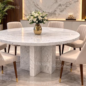 Mesa de comedor redonda moderna de lujo con base de pedestal de mármol blanco macizo. Mesa de comedor de diseño elegante y redonda de mármol blanco.