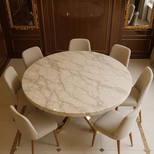 May include: A circular dining table with a marble effect top and a gold-coloured base, surrounded by six beige upholstered chairs. The table and chairs are in a room with wood panelling and decorative mirrors.