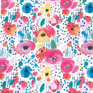 May include: A floral patterned card featuring a vibrant design of pink, red, yellow, and blue flowers on a white background. The card is resting on a white marble surface, with wooden beads in the background.