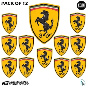 May include: A pack of 12 yellow and black embroidered patches. Each patch features a black prancing horse on a yellow shield with the letters "SF" below. The patches are bordered with green, white, and red stripes. The text "PACK OF 12" is at the top.