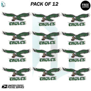 May include: A pack of 12 embroidered patches featuring a green eagle holding a football, with the word "EAGLES" in green and white. The patches are in a repeating pattern. The words "PACK OF 12" and "FREE SHIPPING" are also visible.