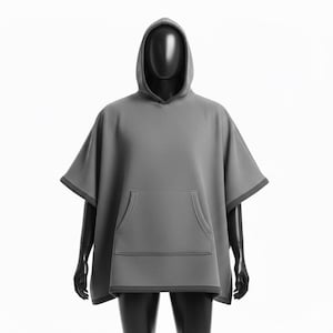 May include: A gray hooded poncho with a kangaroo pocket, displayed on a black mannequin. The poncho has a textured surface and dark gray trim around the hood, sleeves, and pocket. The garment is designed for comfort and casual wear.