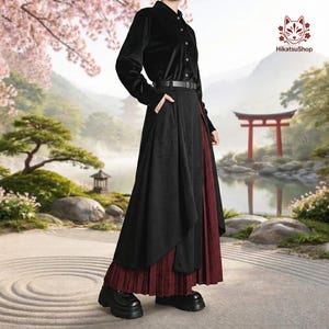 May include: A black long-sleeved button-down shirt paired with a black asymmetrical overskirt layered over a pleated dark red skirt. The outfit includes a black belt with a buckle and black platform shoes. The text HikatsuShop is visible.