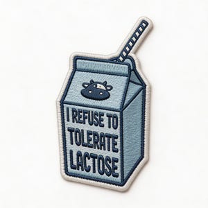 May include: Embroidered patch in the shape of a light blue milk carton with a straw. The carton features a dark blue cow graphic and the text "I REFUSE TO TOLERATE LACTOSE" in dark blue. The patch has a white border.
