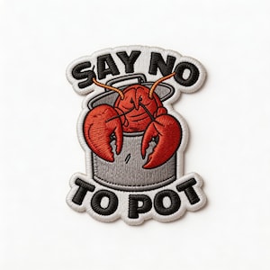 May include: Embroidered patch with the text "SAY NO TO POT" in black and white. The patch features a red crawfish in a gray pot with orange antennae and red claws. The patch has a white border.