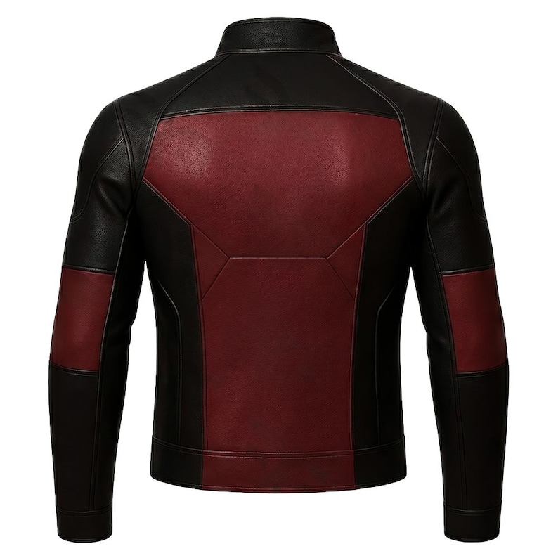 May include: Black and burgundy leather jacket with a stand-up collar. The back features a burgundy panel with geometric stitching, and burgundy patches on the sleeves. The jacket has a classic, streamlined design.