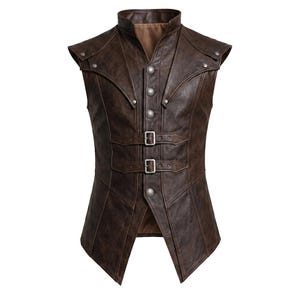 May include: A dark brown sleeveless vest featuring a high collar, a front button closure with metallic buttons, and two horizontal buckled straps across the midsection. The garment has structured shoulder panels with silver-toned rivets.