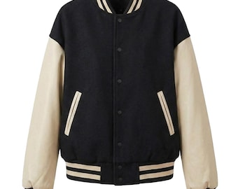 Zwart varsityjack heren, beige leren mouwen, collegebomber