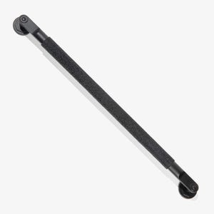 May include: A matte black grab bar featuring a textured, non-slip grip surface along the center section. The bar includes two circular mounting brackets at each end, each secured with a central screw, providing a sturdy support structure.