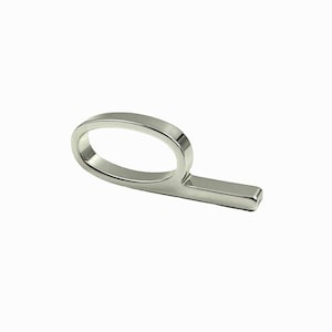 May include: A polished silver-toned metal object featuring a smooth, continuous oval loop connected to a straight, rectangular extension. The surface is reflective and metallic, showcasing a clean, uniform finish with rounded edges throughout the piece.