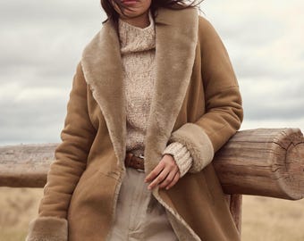 Abrigo de piel de oveja auténtica, chaqueta de invierno de cuero auténtico, prenda de abrigo cálida con forro de piel.