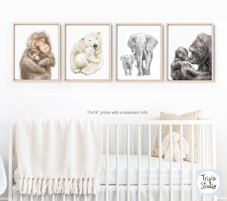 May include: Set of four 11x14 inch prints featuring black and white illustrations of animal mothers and their babies. The animals include a monkey, polar bear, elephant, and gorilla.
