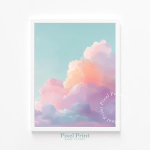 May include: A framed art print featuring a watercolor painting of pastel clouds in shades of pink, purple, orange, and blue against a light blue sky. The print includes the text "Pixel Print Shop Studio".