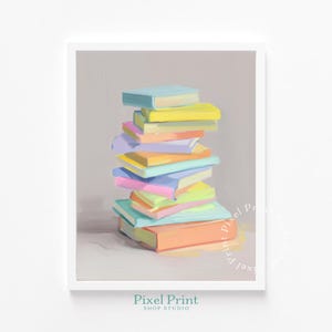 Puede incluir: Una impresión enmarcada con una pila de libros coloridos. Los libros tienen cubiertas de colores pastel en tonos de azul, amarillo, rosa, naranja y morado. La impresión tiene un borde blanco y el texto "Pixel Print Shop Studio" en la parte inferior.