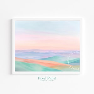 Puede incluir: Una impresión enmarcada de un paisaje con una paleta de colores pastel. La obra de arte representa colinas onduladas en tonos de verde azulado, coral y lavanda bajo un cielo suavemente rosado y azul. El texto "Pixel Print Shop Studio" está en la parte inferior.