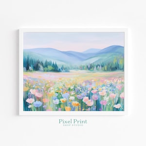 May include: A framed art print featuring a vibrant meadow of wildflowers in shades of pink, yellow, and blue. The background depicts rolling blue mountains and a soft, pastel sky. The text "Pixel Print Shop Studio" is at the bottom.