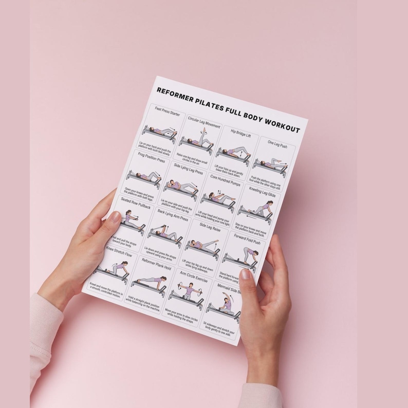 May include: A white printed sheet titled "REFORMER PILATES FULL BODY WORKOUT" held by two hands. The sheet displays illustrated exercise instructions, including "Foot Press Starter" and "Mermaid Side Bend", against a light pink background.