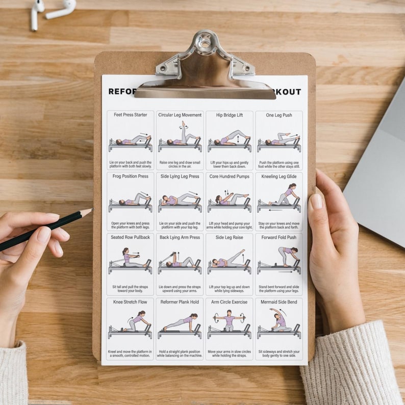 May include: A clipboard displaying a workout routine chart. The chart includes illustrated exercises such as the Feet Press Starter, Hip Bridge Lift, and Mermaid Side Bend. The clipboard is held by a person.