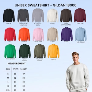 May include: A display of Gildan 18000 unisex sweatshirts in various colors, including black, dark gray, athletic gray, white, dark chocolate, maroon, red, orange, light pink, sand, purple, light blue, Irish green, forest green, military green, and gold. A size chart is also included.