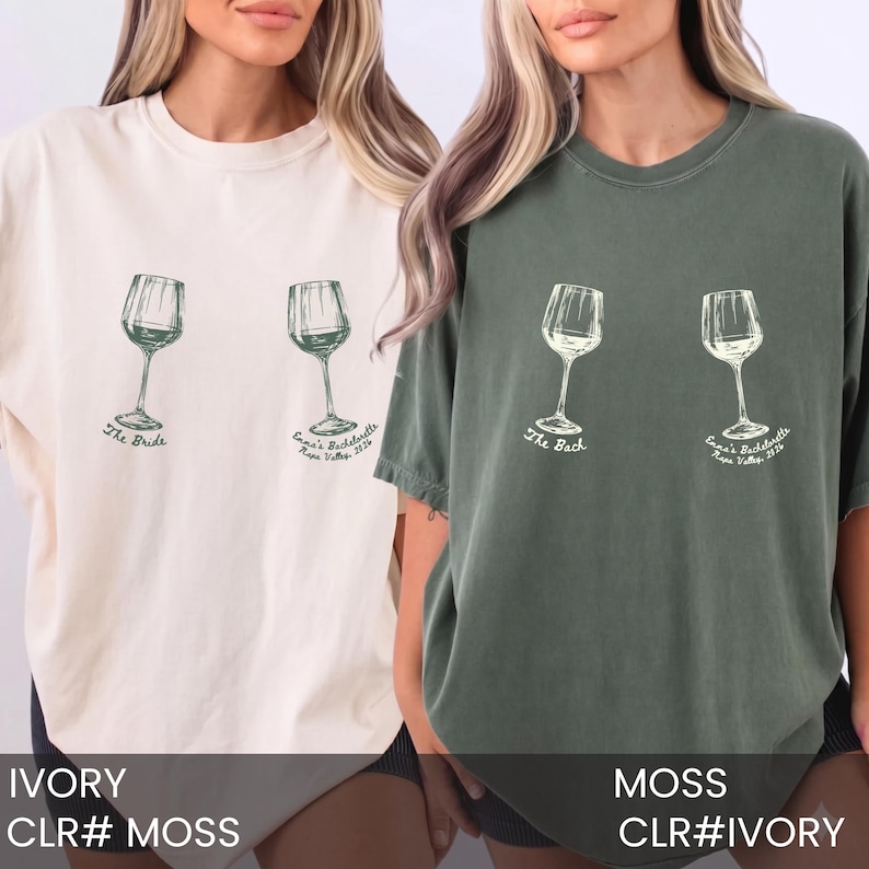 May include: Two oversized crewneck t-shirts in ivory and moss green. Each shirt features two line-art wine glass illustrations. The left glass is labeled The Bride or The Bach, and the right glass reads Emma's Bachelorette Napa Valley 2024.