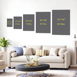 May include: Five gray rectangular canvas prints of varying sizes are displayed on a white wall. The sizes are 8"x12" (20x30cm), 12"x18" (30x45cm), 16"x24" (40x60cm), 20"x30" (50x70cm), and 24"x36" (60x90cm). A sofa and coffee table are in front of the wall.