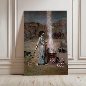 May include: A large framed canvas print of a painting depicting a woman in a long blue dress, holding a staff, standing near a cauldron with a bright light emanating from it. The background shows a desert landscape and a dark sky.