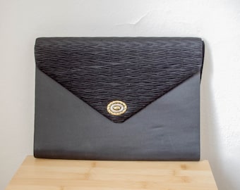 Vintage 80s "Satin Sable" black clutch purse with broach detail