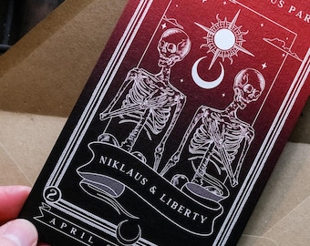 Tarot card save the date featuring a gothic skeleton couple and the phrase Til Death Do Us Part for unique and alternative weddings