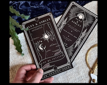 May include: Black and white wedding invitation cards with celestial designs. One card is held by a hand, featuring the text "YOU'RE INVITED" and the date "20th August 2020". The other card has the text "PLEASE SAVE THE DATE OF OUR WEDDING". The words "DOWNLOAD & EDIT TODAY" and "DIGITAL DOWNLOAD" are also visible.