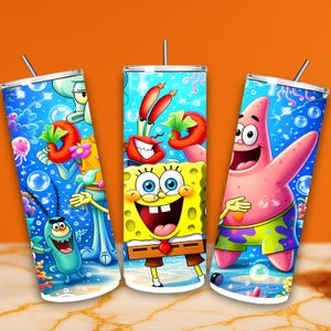 May include: Three stainless steel tumblers featuring colorful cartoon characters from the animated series, SpongeBob SquarePants. The characters include SpongeBob, Patrick Star, Squidward, Mr. Krabs, and Plankton, set against a vibrant underwater background.
