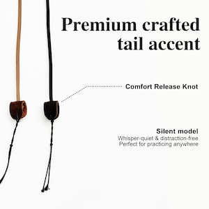 May include: Two vertical cords, one tan and one black, each featuring a brown leather-like slider labeled Comfort Release Knot. Text reads Premium crafted tail accent and Silent model Whisper-quiet & distraction-free Perfect for practicing anywhere.