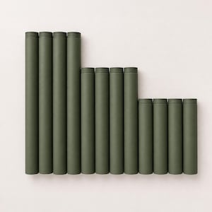 May include: A collection of twelve matte olive green cylindrical tubes arranged in three stepped rows of four. Each tube features a smooth, solid surface with a series of three horizontal ridges near the top edge, creating a uniform, vertical structure.