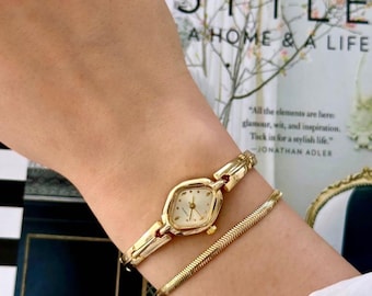 Reloj de pulsera ovalado delicado en oro y plata, elegante movimiento de cuarzo1