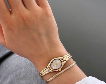 Reloj de pulsera de oro delicado, elegante reloj de pulsera ovalado para mujer