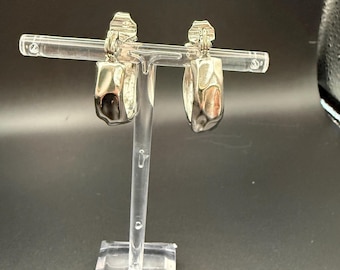 Authentic Yves Saint Laurent (YSL) silver-tone clip-on hoop earrings