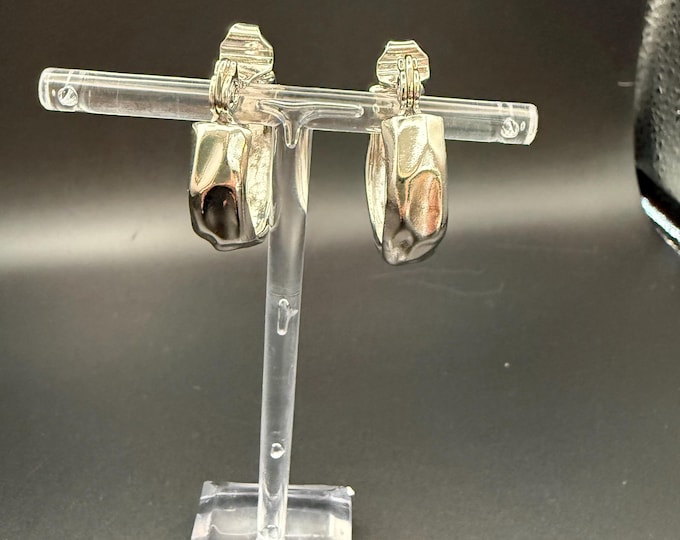 Authentic Yves Saint Laurent (YSL) silver-tone clip-on hoop earrings
