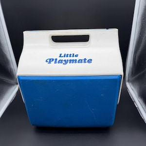 May include: A set of three ceramic nesting bowls in shades of blue, green, and white. The bowls feature a speckled glaze and a simple, modern design. The largest bowl measures approximately 8 inches in diameter.