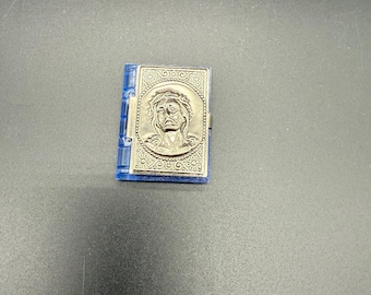 Miniature Devotional Prayer Book Locket – Jesus Christ Relief – Blue Lucite – Vintage Religious Charm